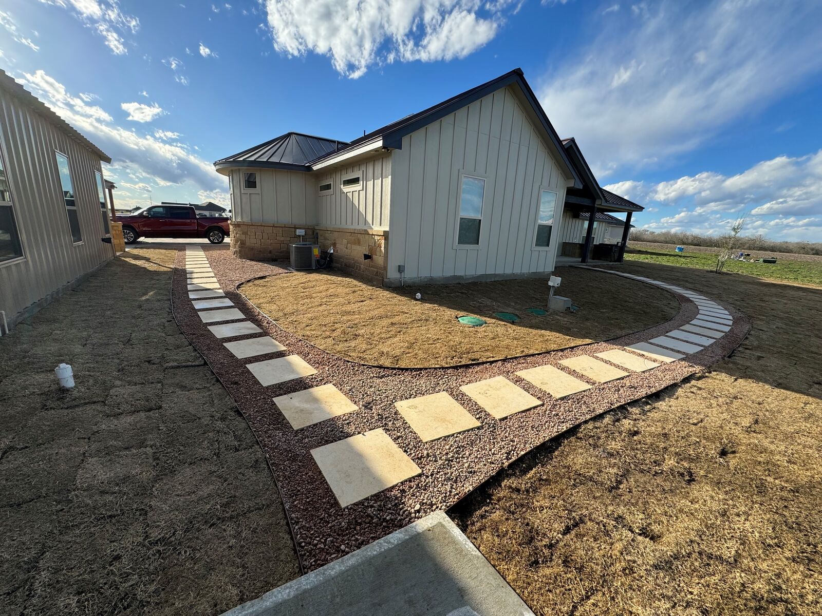 Flagstone path and gravel border on a finished approach
